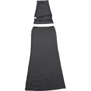 Detail of two-piece charcoal grey set with halter crop top and long skirt.