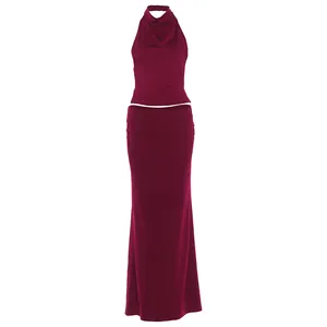Elegant wine red halter neck top and matching high-waist maxi skirt set details