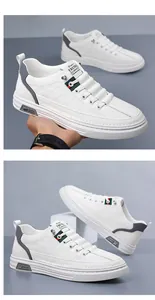 Detail view of stylish white leather men's casual sneakers with durable soft soles