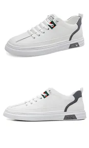 White leather sneakers for men with trendy triangle embossed pattern and soft sole.