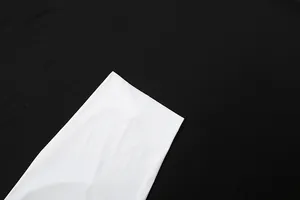 Close-up of smooth white and black fabric texture for women's slim fashion set