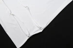 Detail of white sexy backless camisole with adjustable straps and metallic buckles