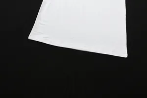 Detailed close-up showing the fine hem stitching of a white solid slim fit top