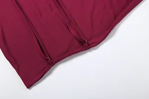 Detailed macro view of wine red backless camisole straps and high quality stitching