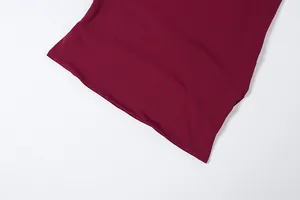 Macro view of the smooth wine red fabric detail for this slim fit spring skirt set