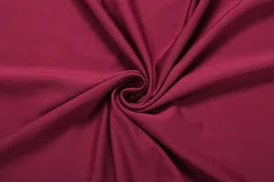Detail view of the elegant wine red knitted fabric for women's two-piece skirt set