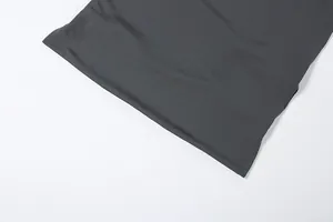 Close-up detail of charcoal grey jersey fabric for women's solid color slim skirt set.