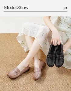 Detailed model showcase of comfortable pink-brown and black loafers with bow decoration