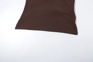 Macro detail of the smooth brown fabric texture of the slim fit solid color clothing set
