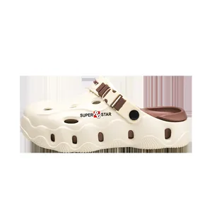 Side view of cream and brown men's platform garden clogs with buckle strap detail.