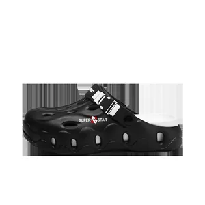Profile view of black men's outdoor beach clogs with Super Star print and white lining.