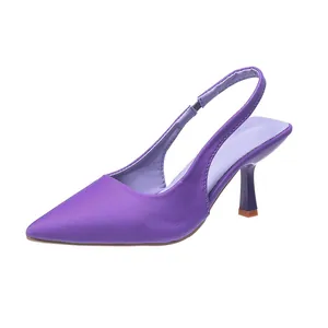 Detailed side view of elegant purple pointed-toe slingback heels with slim high heels