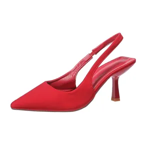 Elegant red pointed-toe slingback heel with a slim stiletto shown from the side