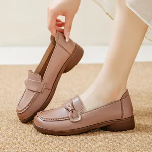Elegant brown slip-on loafers for women featuring a stylish bow and thick anti-slip sole