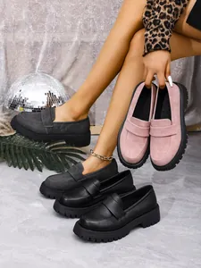 Collection of chunky sole loafers in pink suede, grey suede, and black leather