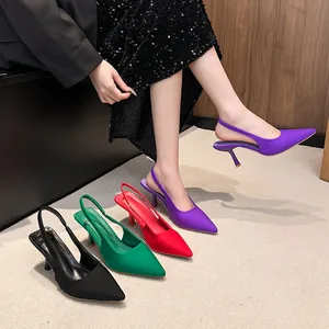 Detail view of elegant pointed-toe slingback high heels in multiple vibrant colors