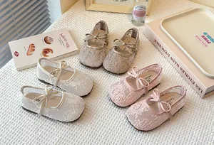 Detailed view of breathable lace mesh Mary Jane shoes for girls featuring cute bow accents
