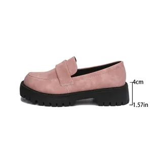Side view of pink suede platform loafers highlighting the 4cm chunky heel height