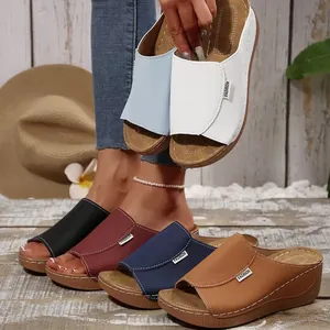 Selection of colorful women's platform wedge slippers featuring peep-toe design