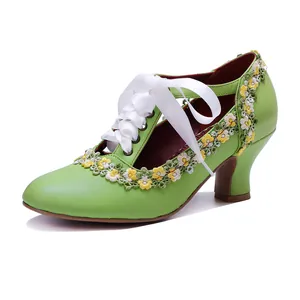 Detail of handmade green leather Mary Jane shoe with daisy lace and white ribbon laces