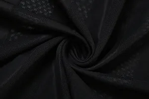 Vista macro detallada de la textura de la tela de malla negra transparente para vestido