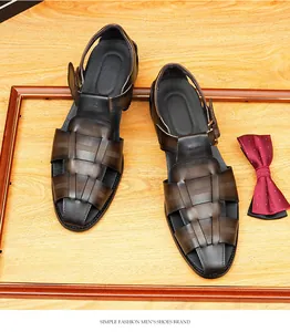 Close-up view of dark brown woven leather sandals for men in British style