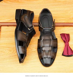 Detailed top view of brown woven leather closed-toe men's sandals with gradient finish