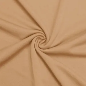 Close-up macro view showing the soft texture and knit of camel quick-dry athletic fabric