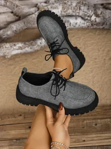 Vintage-Loafer für Damen mit dicker Sohle aus grauem Canvas im britischen Stil