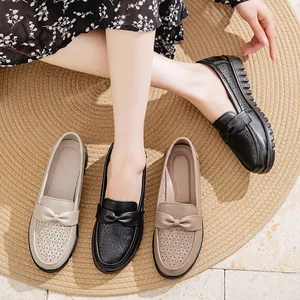 Breathable leather loafers for women with bow detail and perforated design in multiple colors.