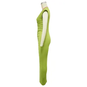Side view of a lime green ruched bodycon sleeveless maxi dress with a deep V-neckline