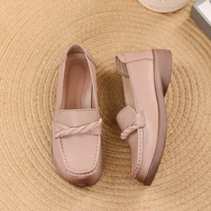 Comfortable soft leather loafers for women with non-slip gum sole and twisted strap.