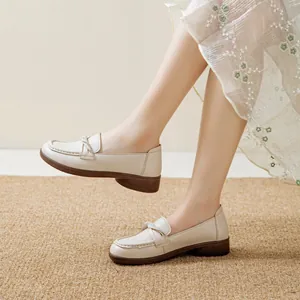 Comfortable cream beige slip-on flat loafers for women with soft non-slip soles