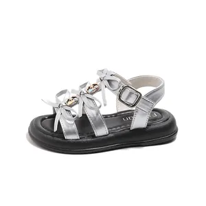 Silver girls' sandals with thick soles and decorative bows for summer beach wear
