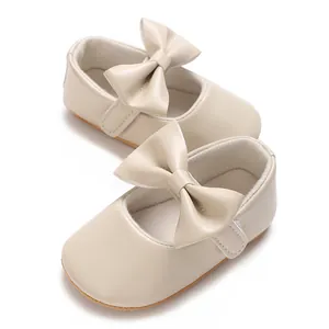 Elegante beige Baby-Lauflernschuhe für Mädchen mit weicher Sohle und schöner Schleife