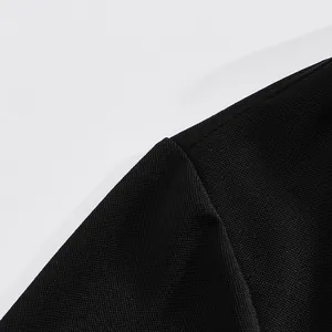 Macro detail showing the breathable black mesh fabric on a men's quick-dry Polo shirt