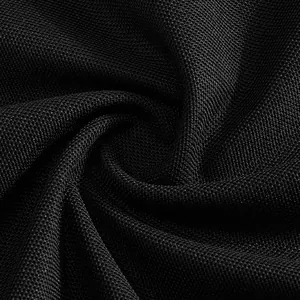Close-up macro detail of black breathable mesh fabric texture for athletic polo shirts