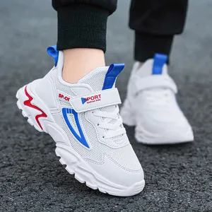 Classic white breathable kids sports sneakers with blue and red accents for outdoor play