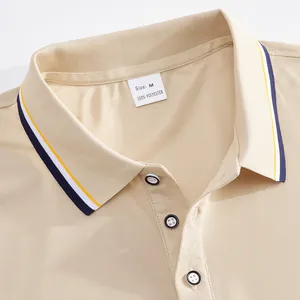 Close-up detail of a beige quick-dry mesh polo shirt collar with size M tag.