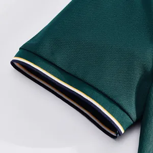 Detailed view of dark green mesh polo shirt sleeve showing striped ribbed cuff texture