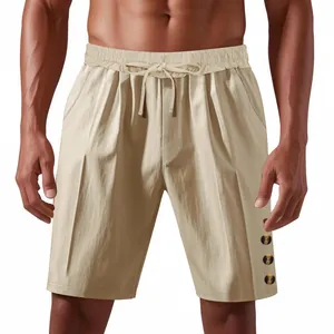 Detailed view of men's beige linen shorts with drawstring waist and decorative buttons