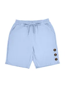 Detail view of light blue linen casual shorts featuring decorative side buttons and drawstring