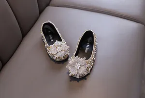 Sparkling rhinestone girl's princess shoes with pearl accents and flower detail