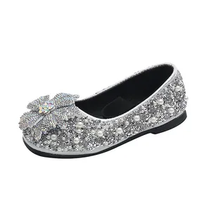 Elegant silver rhinestone princess shoes for girls featuring delicate pearl accents and bow