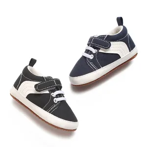 Soft-soled non-slip baby sneakers with Velcro straps in navy blue and black canvas