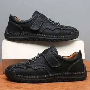 Zapatos casuales de cuero negro para hombre con costuras blancas y velcro