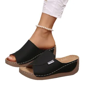 Black wedge platform slippers with peep-toe design for stylish casual summer wear