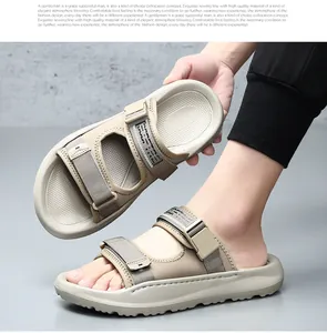 Detailed view of khaki men's casual beach sandals with adjustable Velcro straps.