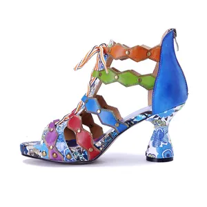 Side view of colorful handmade leather Bohemian high heel Roman sandals with studs