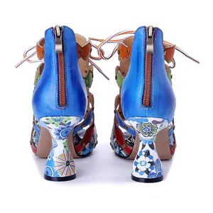 Rear view of colorful Bohemian leather sandals featuring unique floral patterned heels.